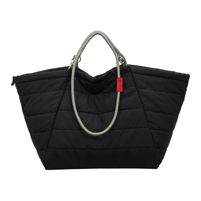 Simple primavera y verano nuevo 2026 nube hombro bolsa de gran capacidad de viaje de viaje de acondicionamiento físico bolso portátil mujer