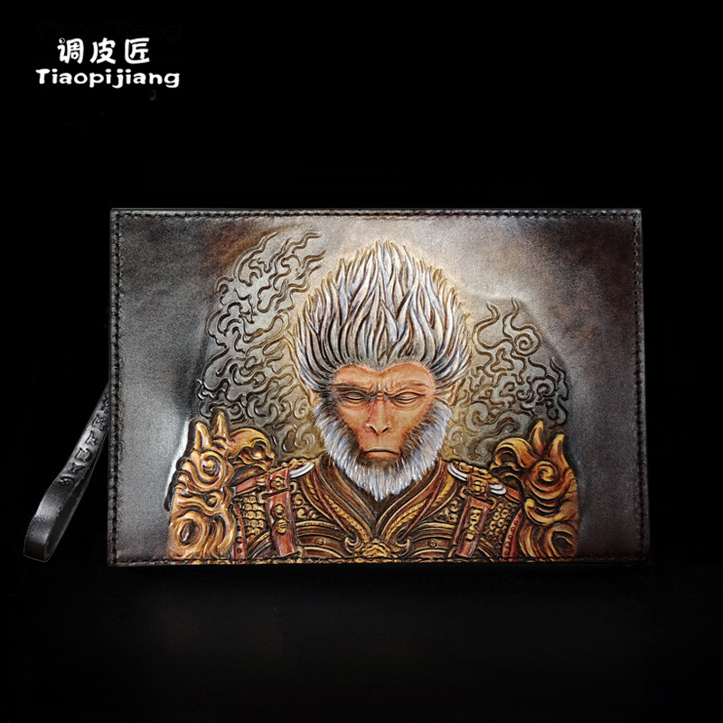 调皮匠手包男高级感手抓包潮真皮大容量黑神话悟空个性皮雕手拿包