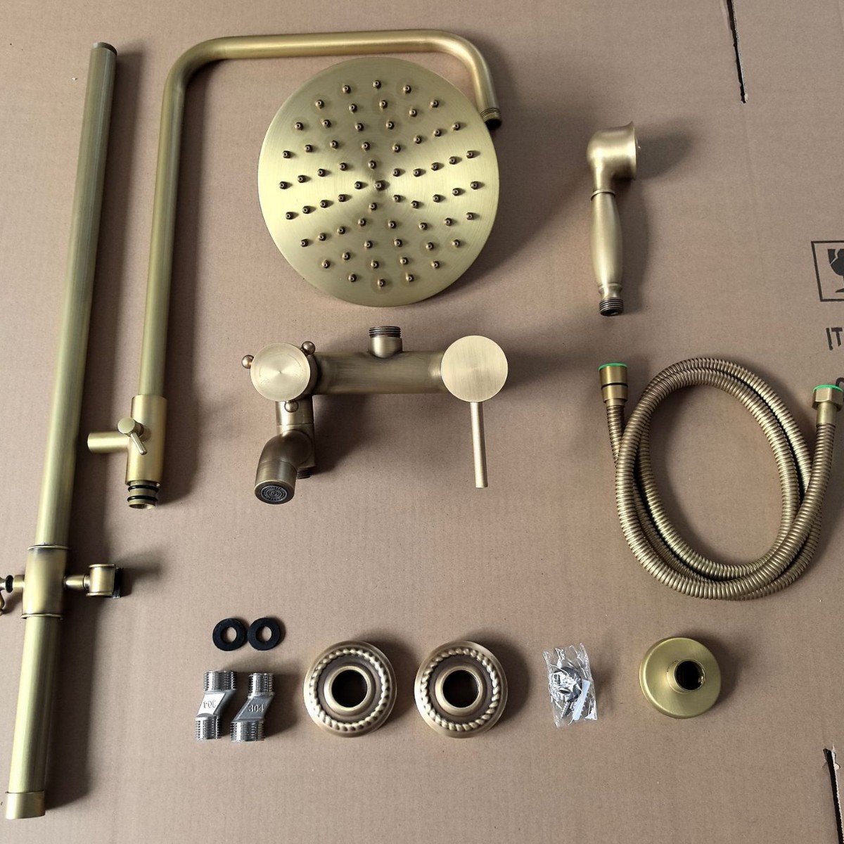 Juego de ducha de estilo retro de lujo europeo explosivo transfronterizo, ducha antigua de cobre, grifo de válvula mezcladora de agua fría y caliente, baño