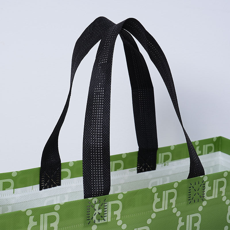 Bolsas de tela no tejida retro clásicas bolsas de compras portátiles publicitarias de ropa impresa en color bolsas de embalaje de película impresa personalizada stock