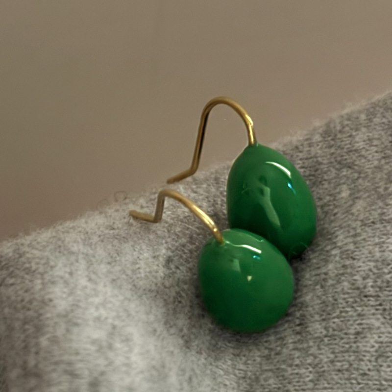 Gancho de oreja-dorado-verde