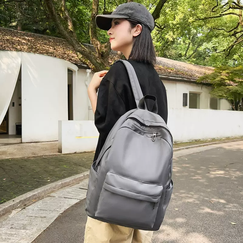 新款纯色书包女中学生少女双肩包初高中生大容量男士背包中性背包