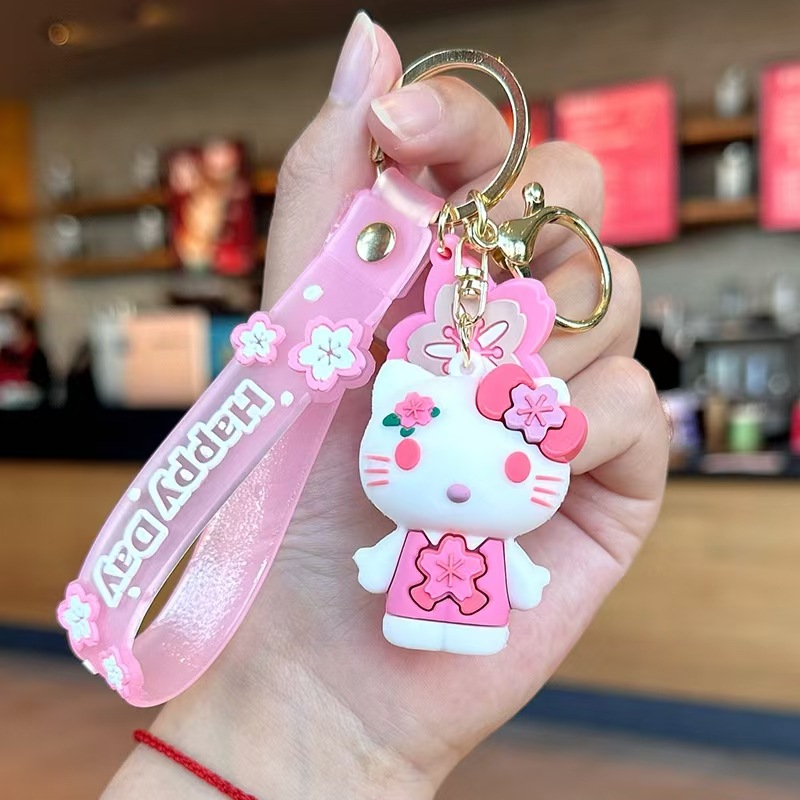 Perro de orejas grandes Melody KT gato pudín perro Kolomi caricatura de silicona llavero colgante bolsa colgante caja ciega regalo