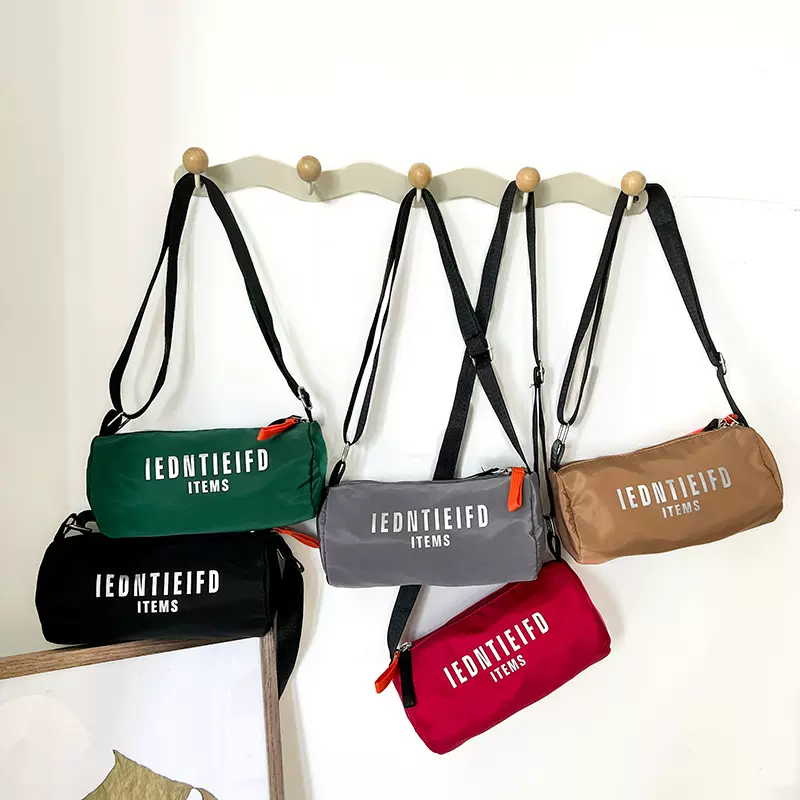 潮酷男童斜挎包休闲简约尼龙小布包ins网红儿童配饰包字母单肩包