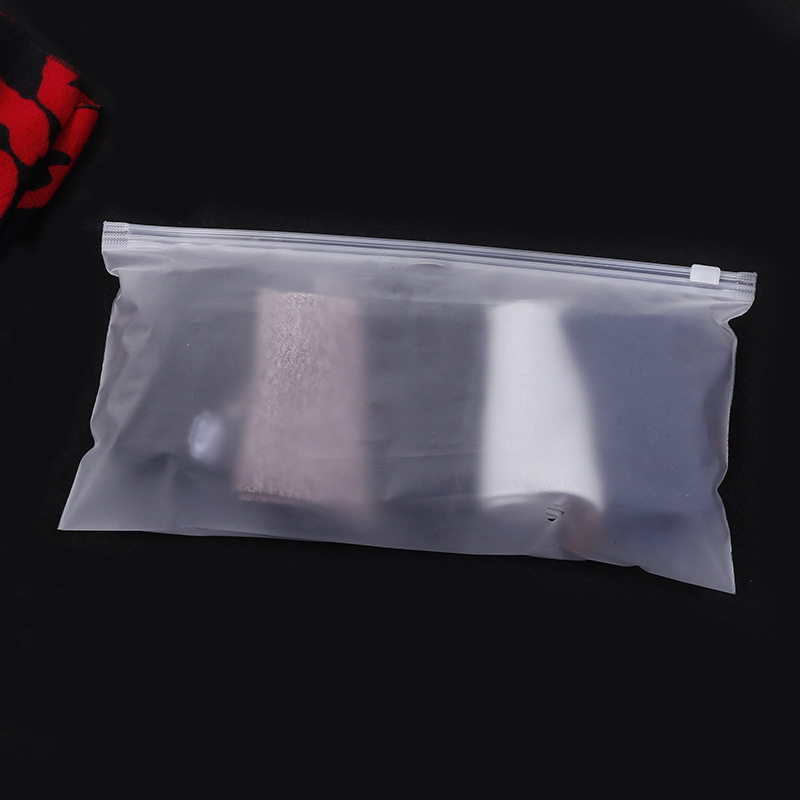 Bolsa con cremallera de ropa Bolsa con cremallera de crisantemo pequeño Bolsa de embalaje de camiseta Bolsa de ropa interior Bolsa de ropa PE esmerilada pequeña bolsa ziplock