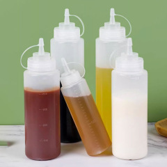 ジャム瓶トマトサラダソースのプラスチックの鋭い口を押して瓶を押して業務用の油壺の家庭用ソースソースの調味料の瓶を押します。