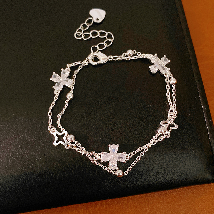 Flores de hierba afortunadas pulsera de doble capa ligera de lujo nicho pulsera de alta sensación temperamento diario joyas de moda al por mayor image 10