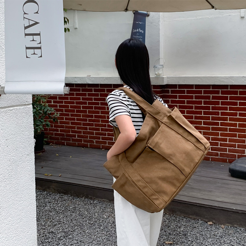 Estilo coreano casual color sólido Internet celebridad moda bolsa de tela simple moda de gran capacidad todo fósforo de las mujeres solo hombro bolsa de lona