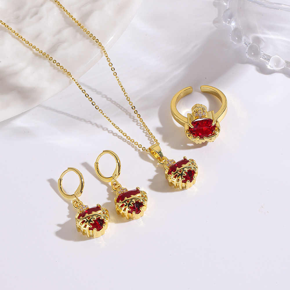 Fashionable copper red earrings with zircon