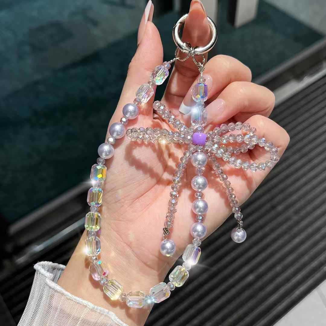 cadena de teléfono móvil estereoscópico de alta calidad arco de cristal caja de teléfono móvil colgante perla cuerdas de muñeca cuerdas de cuentas mujeres