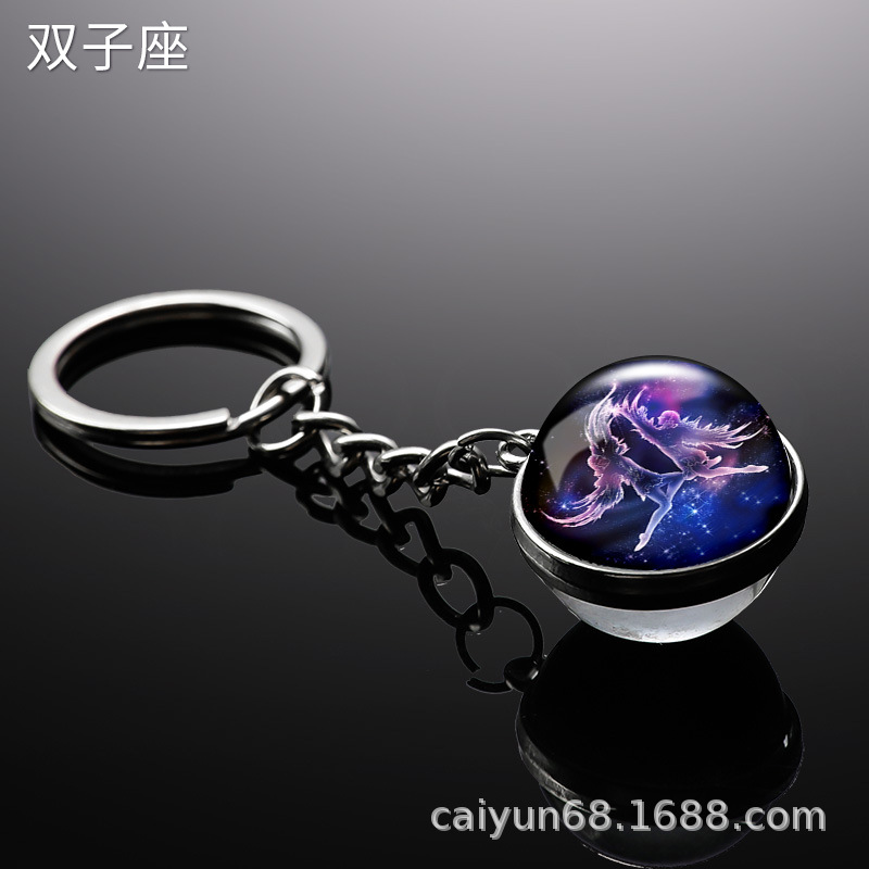 Transfronterizo 12 constelaciones de luz nocturna bolsos colgantes de bolsas de joyas de tiempo doble cara bola de vidrio llavero al por mayor