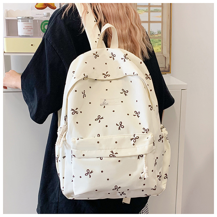 Japanese-style minimalist casual large-capacity backpack for middle and high school students, lightweight and trendy school daypack for girls