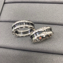 高版本宝家小红人慈善款黑白陶瓷戒指男女情侣对戒弹簧指环礼物