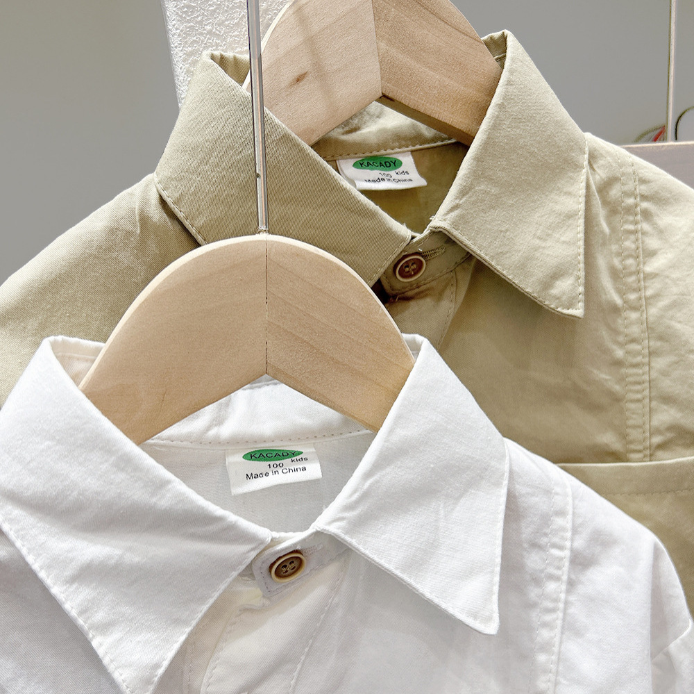 2024 primavera nueva ropa para niños medianos y grandes camisa de manga larga de color sólido de estilo coreano para niños solapa blanca casual