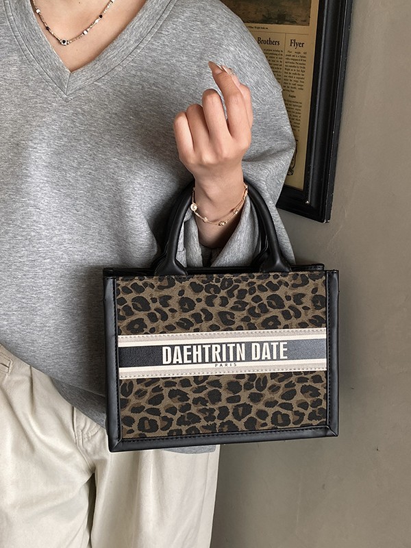 Leopardo retro versátil bolso de mano de viaje de mujer nuevo estilo transfronterizo de alto valor visual de gran capacidad retro bolso de ocio