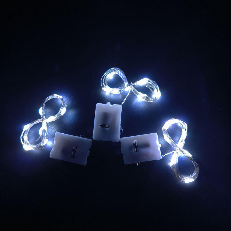 65000810 led铜线小白盒灯串-1米10灯 正白