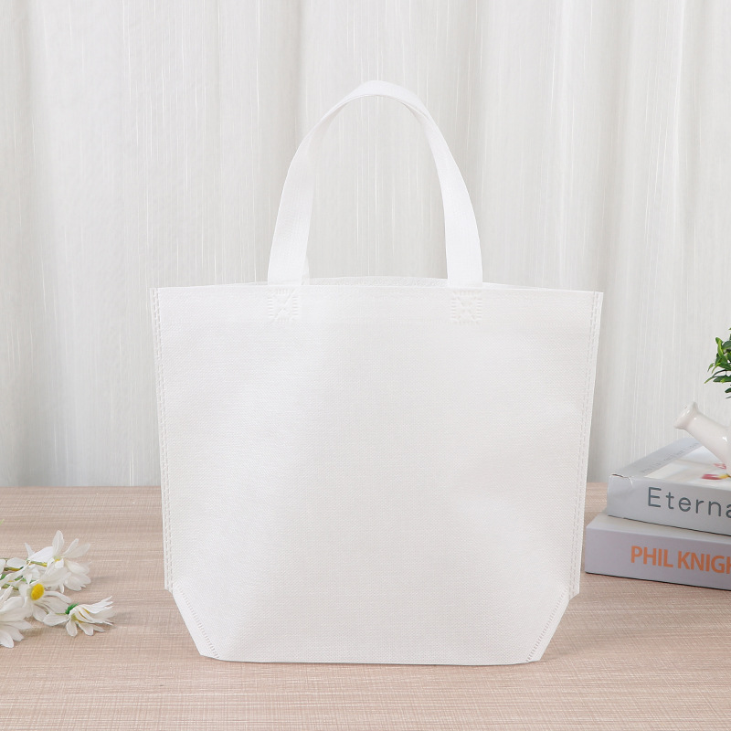Bolsas de tela no tejida en blanco en stock, bolsas de tela no tejida portátiles, bolsas de prenda, logotipo de impresión image 30