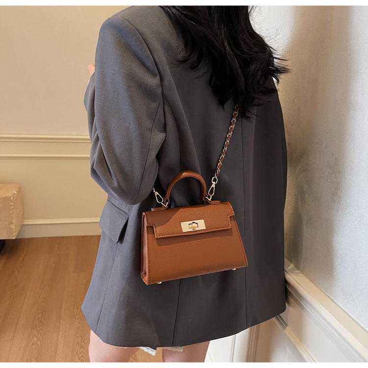 Bolso de mujer 2026, nuevo modelo transfronterizo, bolso de mano de textura de alta calidad, bolso cuadrado pequeño Kelly, bolso de hombro cruzado de moda francesa.