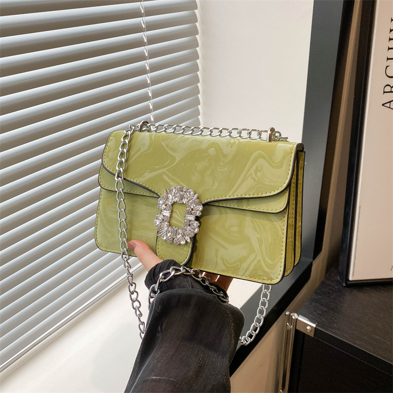 Moda simple temperamento coreano cadena de hombro bolso de mochila para mujeres 2024 primavera nueva bolsa de diamantes de estilo extranjero