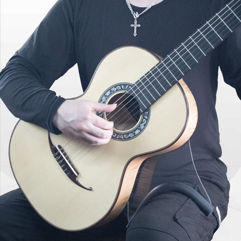 Medio de nuevo succión aerodinámico piano titular guitarra clásica instrumento musical accesorios principiante generación reposapiés guitarra soporte al por mayor