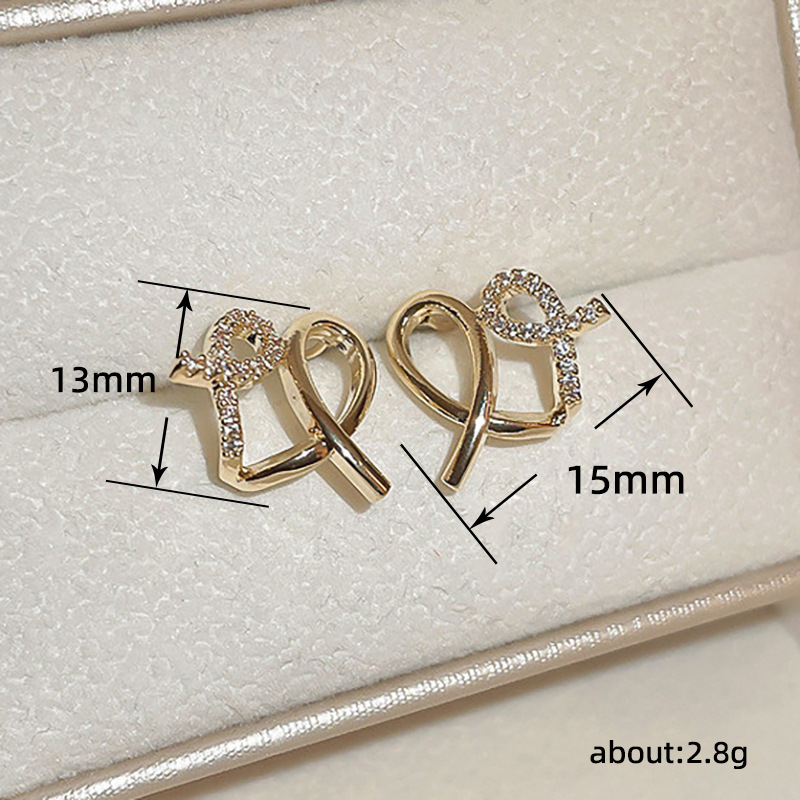 Gold Criss-cross Stud Earrings Minimalist Celebrity Style_voghion.com