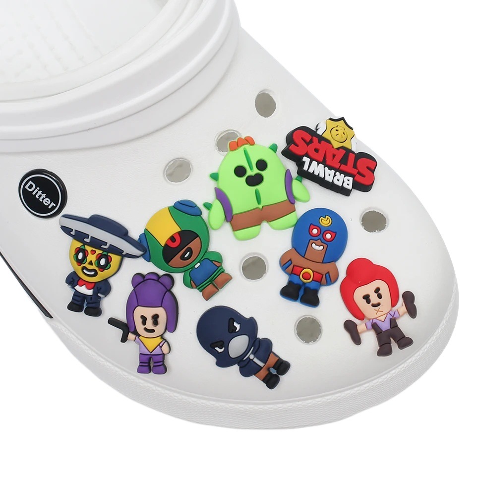 Comercio electrónico transfronterizo al por mayor zapatos de goma suave zapatos de flores accesorios PVC desierto al azar cubo agujero Zapatos de flores hebilla