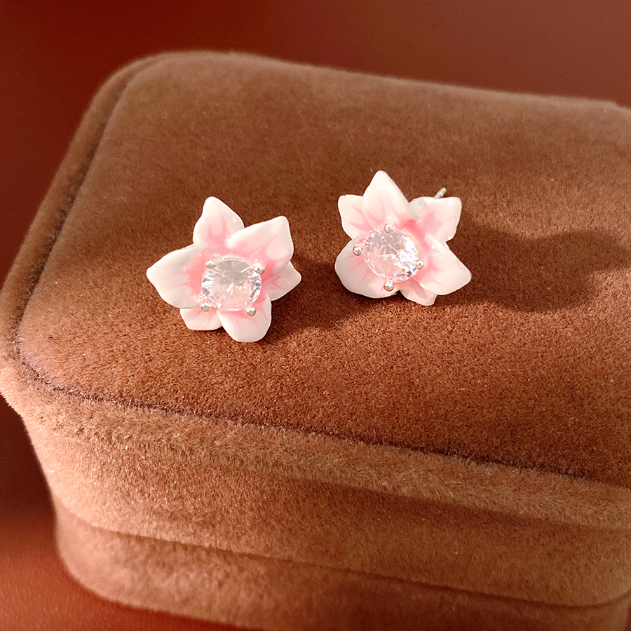 Agujas de plata goteando aceite de piedra de flores de piedra de acoplamiento de vacaciones estilo pastoral aretes dulces aretes ligeros de lujo de alta calidad aretes