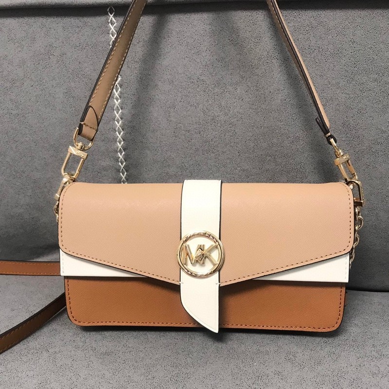 M家の女性カバンGreenwichの棒は脇の下を包んでファッション的な酒の神を包んで肩を斜めに掛けて小さい方のカバンを持ちます。|undefined
