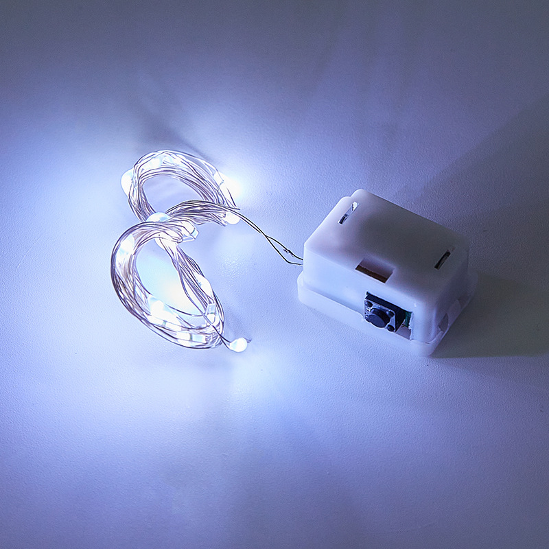 Caja blanca pequeña lámpara de alambre de cobre led botón batería linterna de Navidad luz intermitente cadena de bola de onda decoración al por mayor alambre de cobre