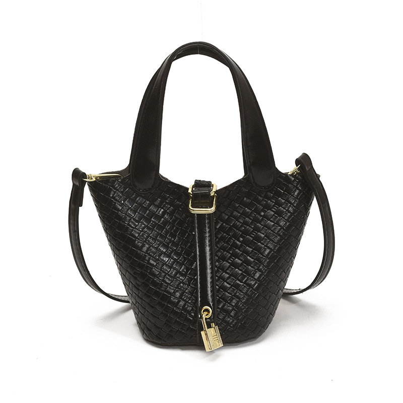 Bolso de cubo portátil con patrón tejido para mujer 2025 nuevo estilo coreano de lujo ligero de alta gama bolso de mensajero para niños de nicho
