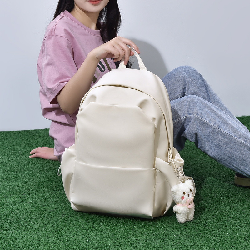 Carefully Selected High-Quality Trendy Large-Capacity Solid Color Student Backpacks for Women Korean Version Versatile College Style Schoolbags for Men Wholesale