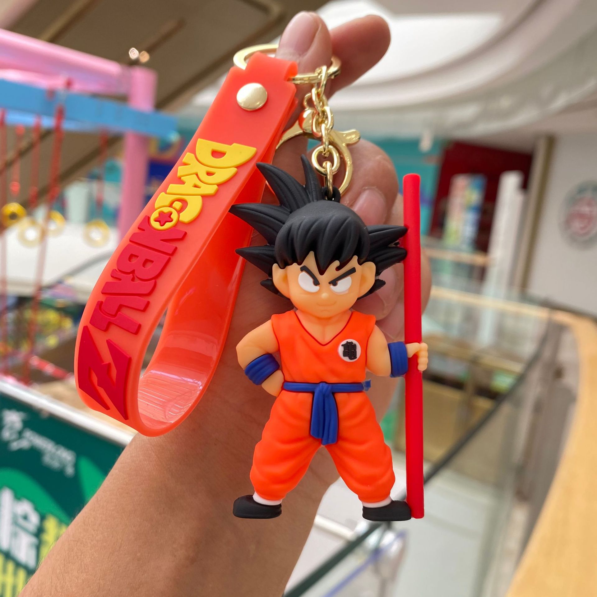 Llavero Dragon Ball-Aro dorado-abrigo naranja