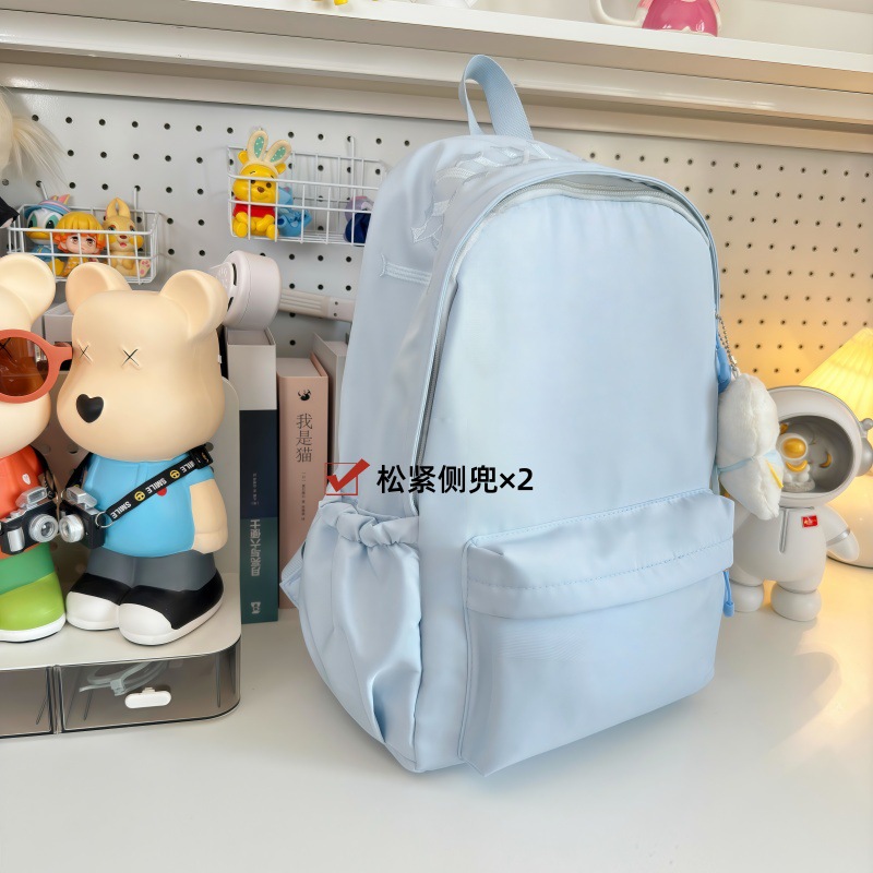 Solid color Korean-style backpack for school, large capacity, simple and textured, Japanese college style student bag