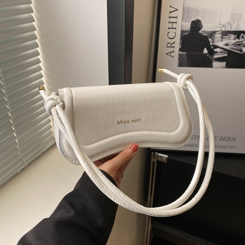 Textura bolso de axila portátil 2024 primavera nueva moda bolso de mensajero francés color sólido bolso cuadrado pequeño retro de un solo hombro