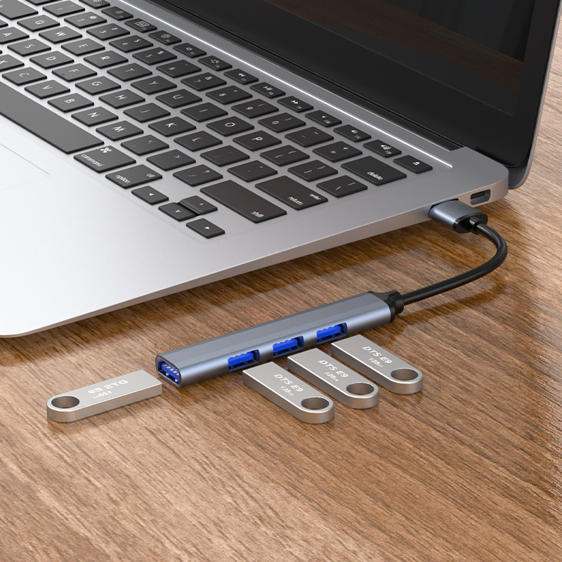 USB extensor multifunción de uno a cuatro Hub divisor de expansión muelle computadora multi-interfaz