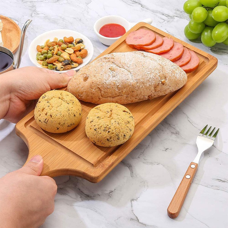 Nueva tabla de cortar de bambú fábrica al por mayor tabla de cortar de bambú hogar herramientas de cocina tablero de pizza tablero de queso de Bambú