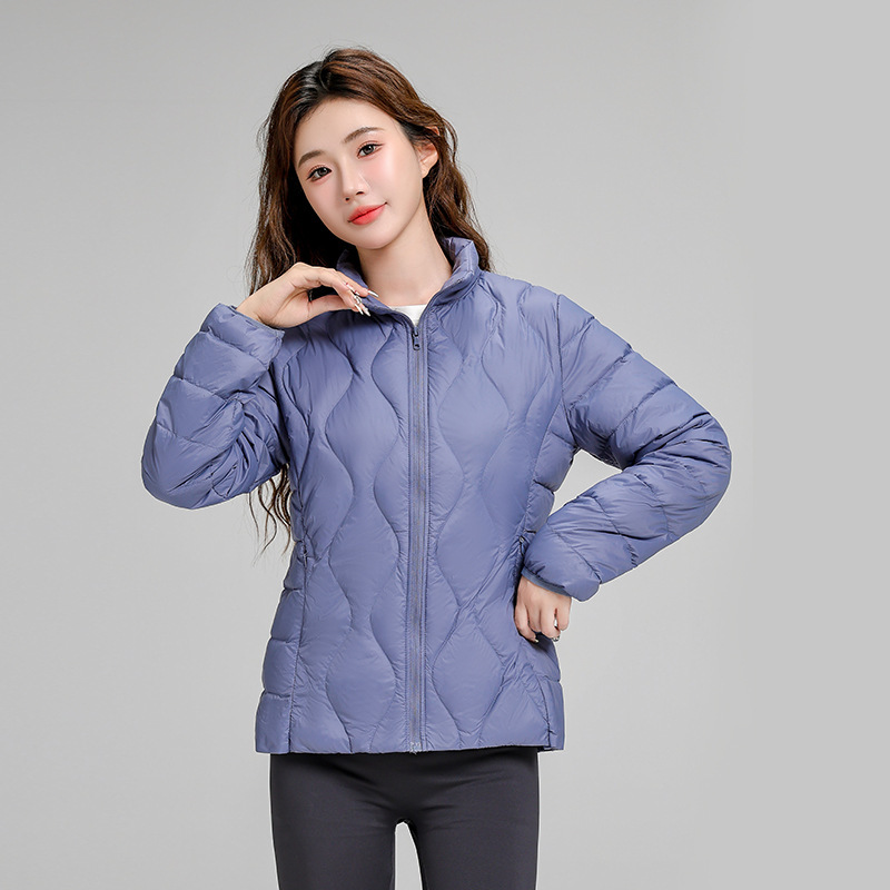 Chaqueta de plumón casual ligera de mujer moda polifacética blanca ligera caliente invierno y otoño abrigo delgado grande