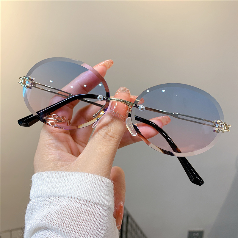 New Sunglasses Women's Oval Gradient Sunglasses Frameless Cutting Edge Trendy Glasses_voghion.com