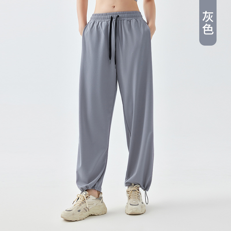 2024 Otoño e Invierno Nuevos pantalones de yoga de talla grande Pantalones de fitness de bolsillo europeos y americanos para mujer con cordón de cintura alta para adelgazar pantalones largos al por mayor
