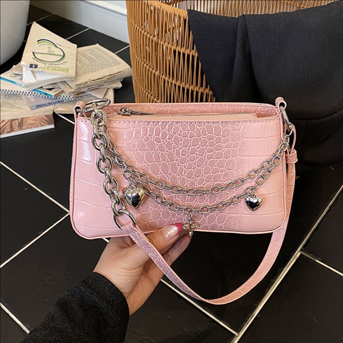Nicho de diseño de cadena de viaje bolso pequeño para mujeres 2026 verano nuevo estilo de alta calidad cocodrilo mochila de hombro