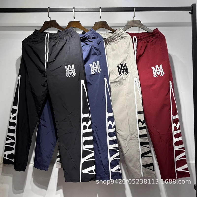 26 Spring New Style Amiri Letter Logo Pattern Printed Nylon Waterproof Pants for Men and Women, One Piece Wholesale