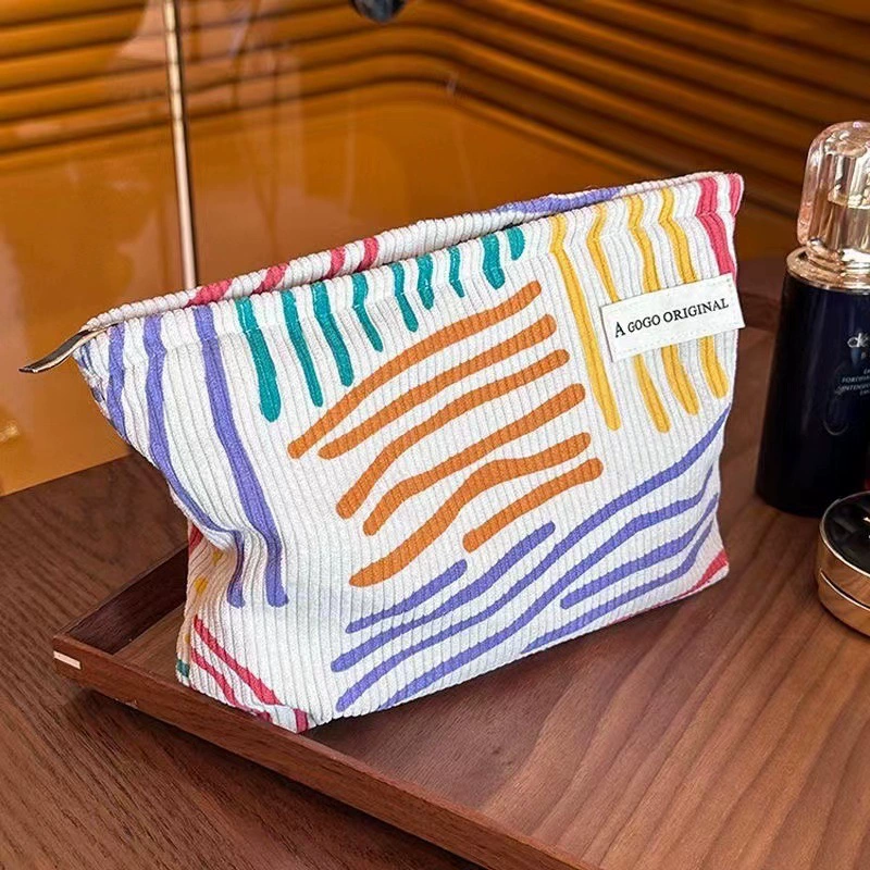 Handheld storage system, cosmetic bag, shopping bag, travel bag