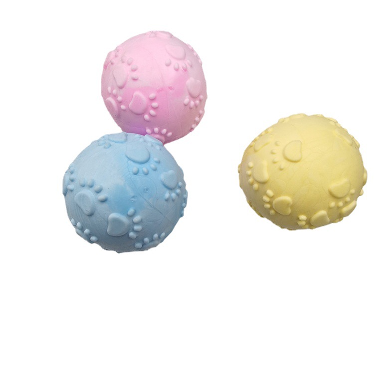 Transfronterizo juguete para mascotas huellas de espuma TPR bola mordedura molar sabor a leche bola sólida fábrica de juguetes para perros