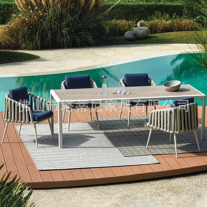 Villa jardín terraza ocio mesas y sillas al aire libre patio piscina resort mesa redonda impermeable muebles de tejido de cuerda solar