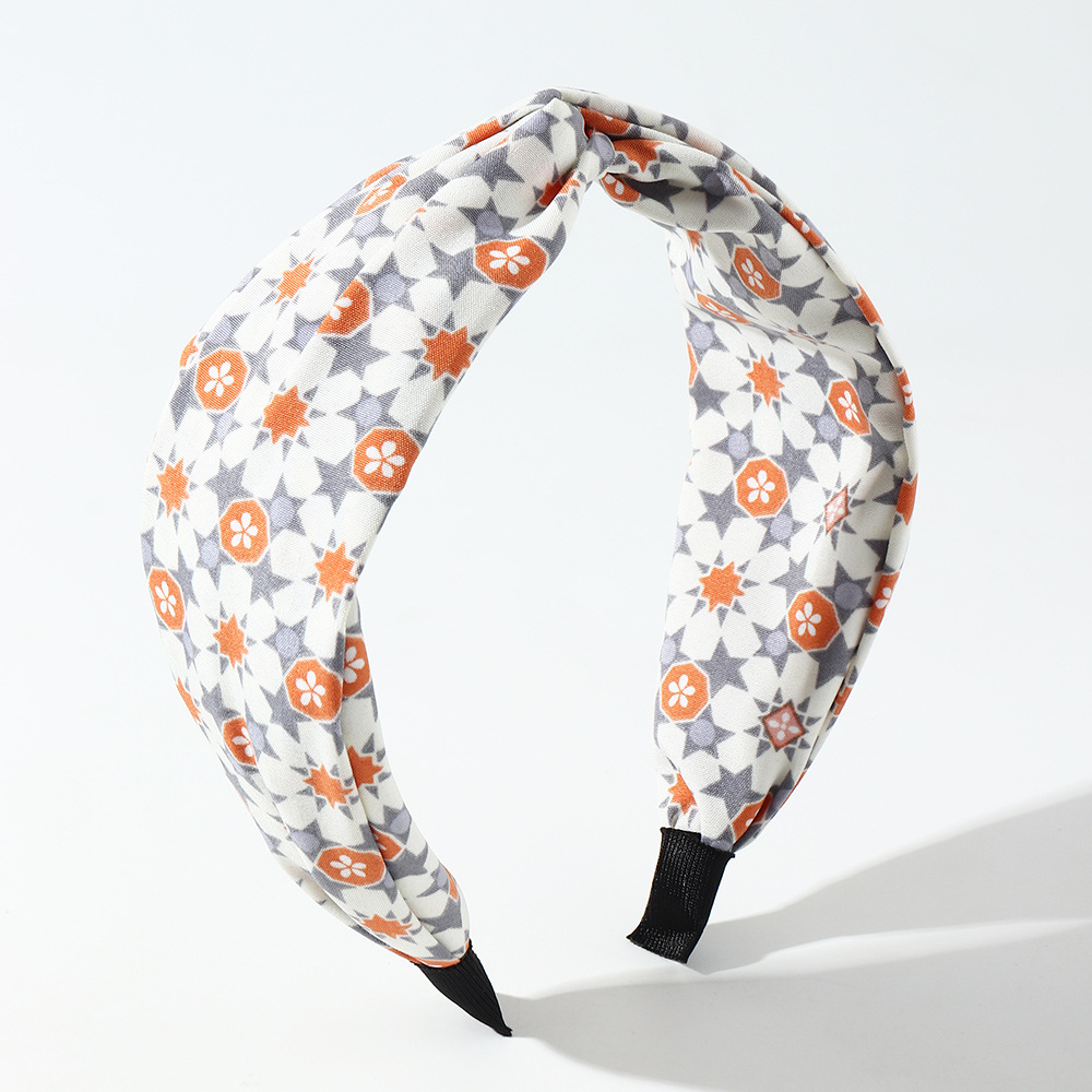 Korean Style Floral Printed Fabric Cross-knotted Headband Wholesale Nihaojewelry display picture 7