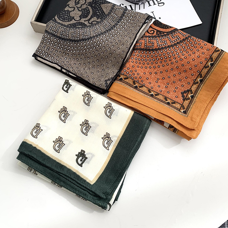 Bufandas de seda cuadrada alta sensación 2025 nuevo estilo coreano delgado moda versátil algodón lino atado pelo bolsa bufandas al por mayor