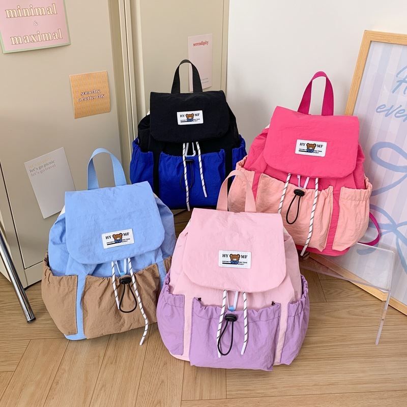 Estudiantes de la escuela primaria viajan y estudian mochila coreana de color contrastante, mochila para niños y niñas, 2026 nueva moda de mochila infantil