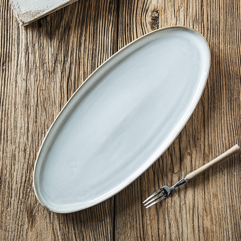 Estilo nórdico simple platos de cerámica oval casero plato de pescado al vapor horno de sushi plato de alta sensación