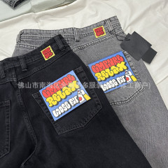 外国貿易のデニムのスケートボードのズボンのpolarの純粋な黒のbig boyのアルファベットの刺繍の耐摩耗性のまっすぐな筒のゆったりしているスターの同項