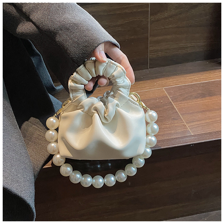 255g Weight Beading, Pearls Fashion Element Clasp Frame Closure Type Top Handle, Chain Strap Type Crossbody Bag Bags Type Casual, Daily, Shopping Occasion Pu Leather Material Solid Color Pattern All Seasons Season Kid'S Gender Cute Style Bucket Shape Kid'S Pu Leather Solid Color Cute Beading Pearls Bucket Clasp Frame Crossbody Bag 27